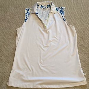 Woman’s golf shirt size M